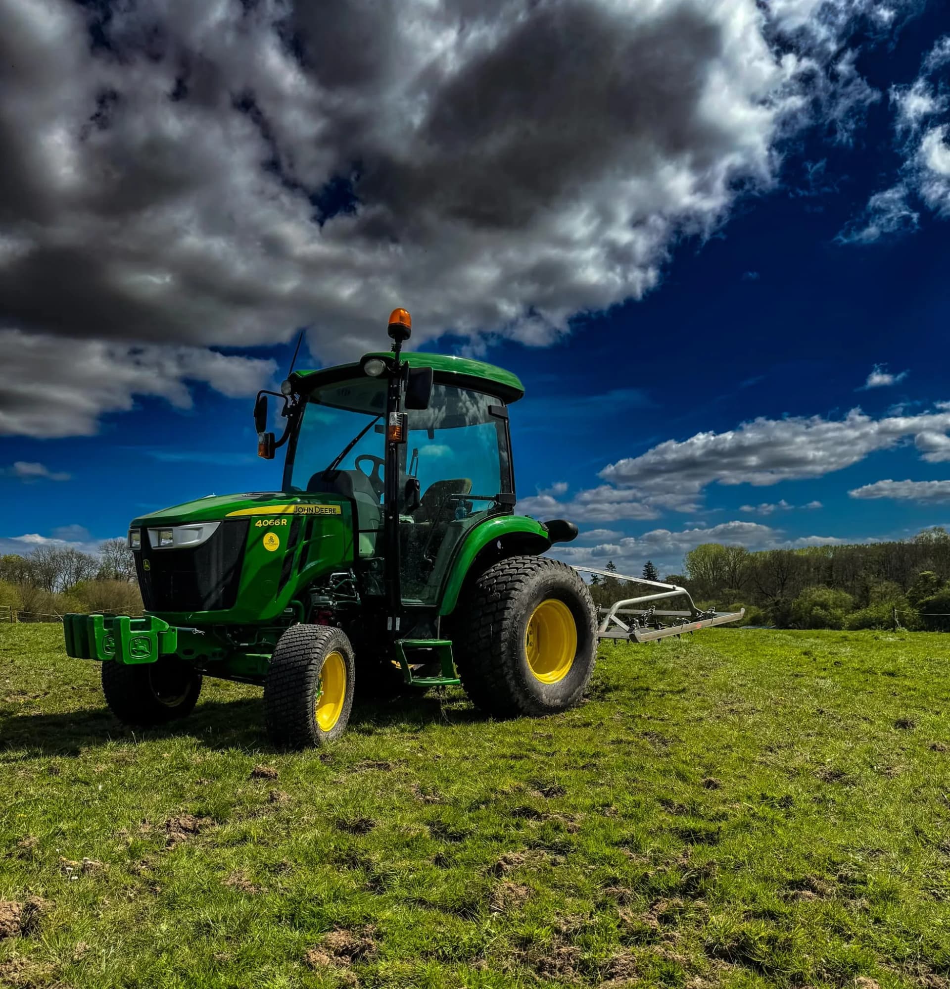 Harrowing with a John Deere 4066R
