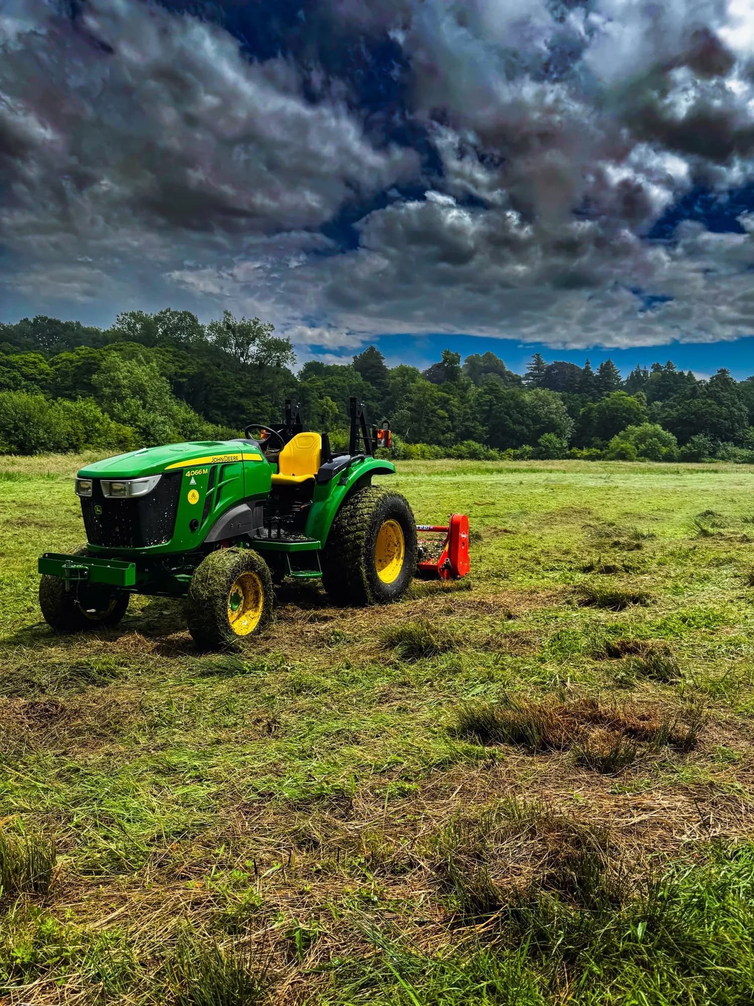 John Deere 4066M and Kuhn BP20 flail