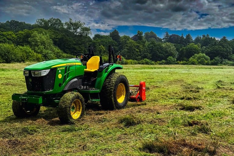 John Deere 4066M and Kuhn BP20 flail