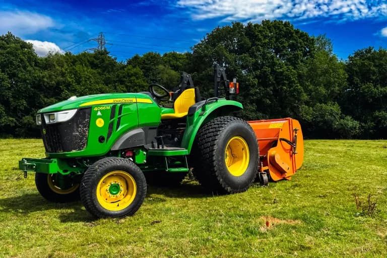 John Deere 4066M flail collecting