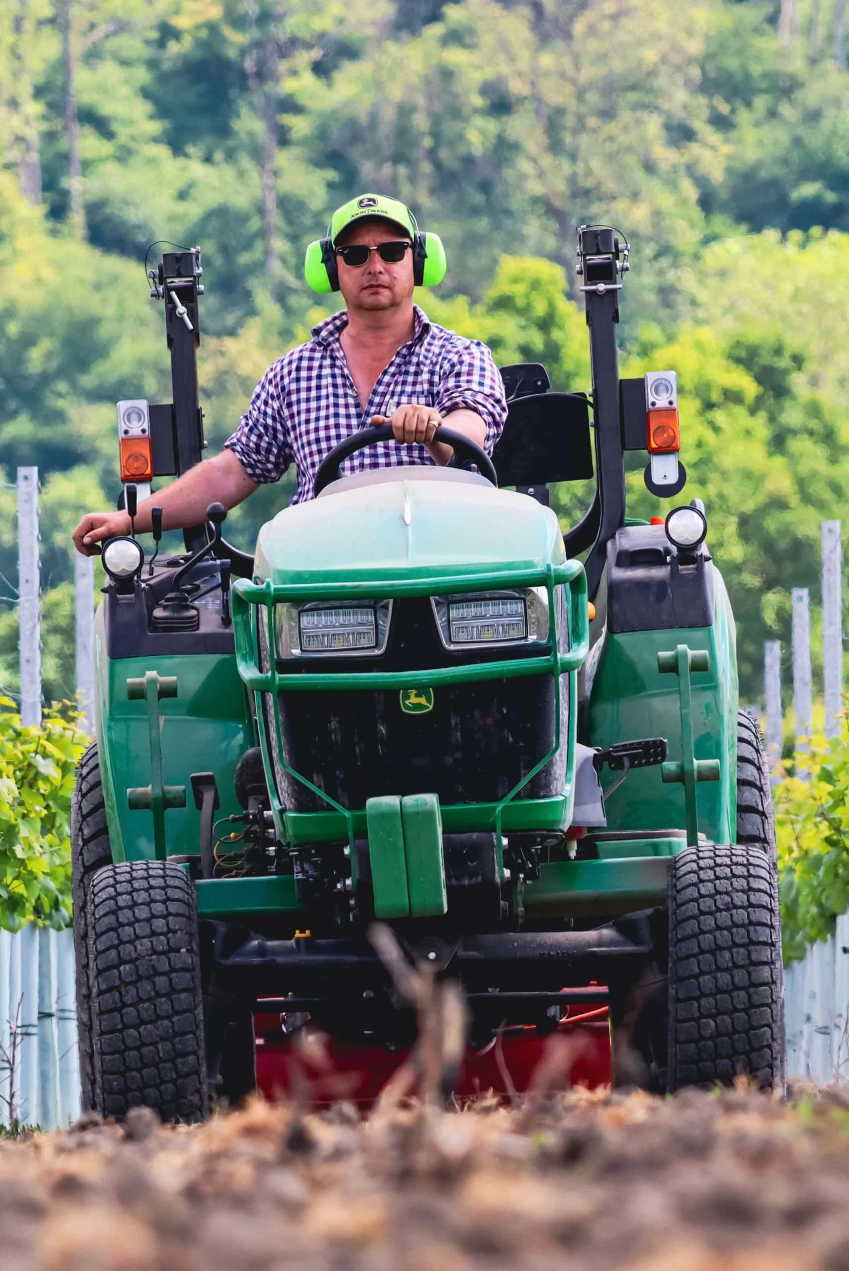 John Deere 2038R stone burying and seeding Burcombe estate vineyard