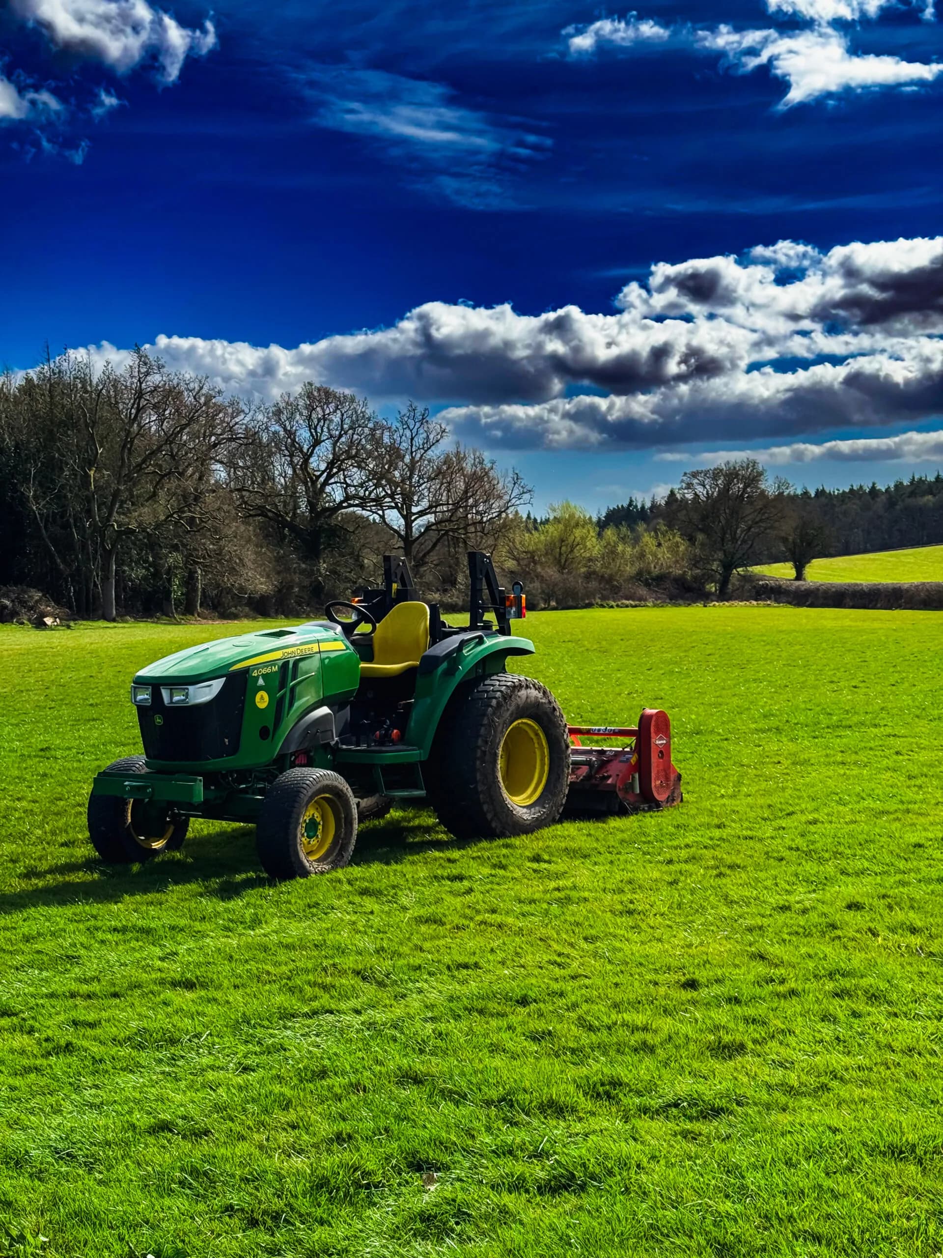 John Deere 4066M with Kuhn Flail mower